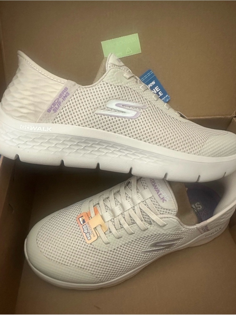 Skechers Women's Slip-On GOwalk Sneakers in Light Taupe with Lavender Accents